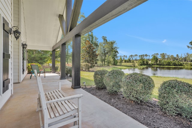 view of patio / terrace featuring a water view