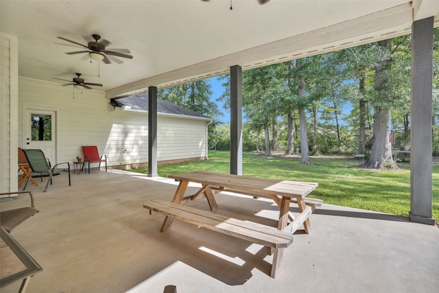 view of patio featuring ceiling fan