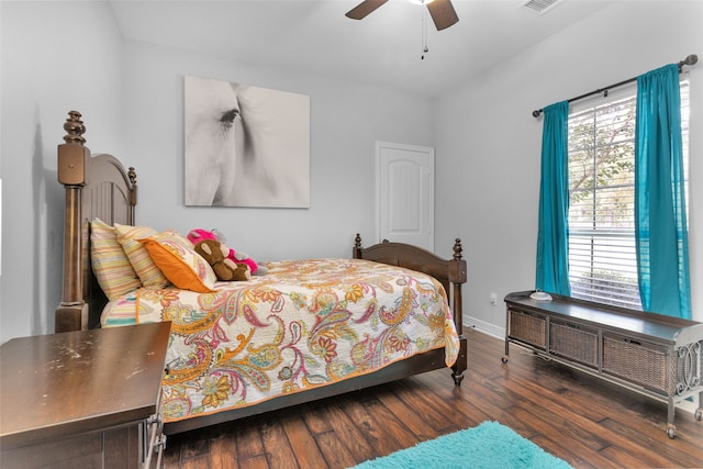 bedroom featuring ceiling fan and dark wood-type flooring