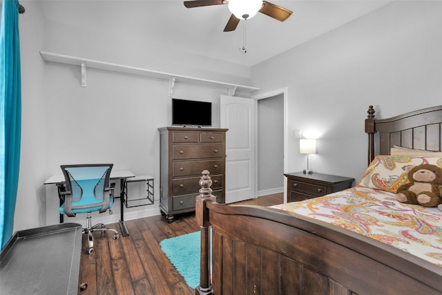 bedroom featuring dark wood-type flooring and ceiling fan