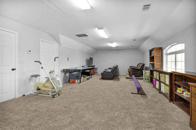 rec room featuring carpet floors and lofted ceiling