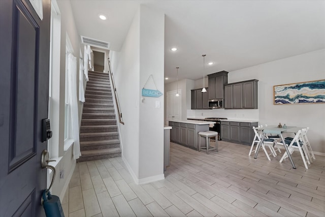 entrance foyer featuring light wood-type flooring