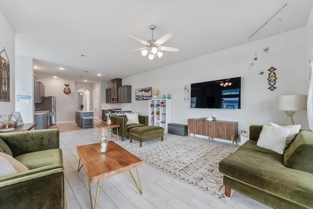 living room featuring ceiling fan