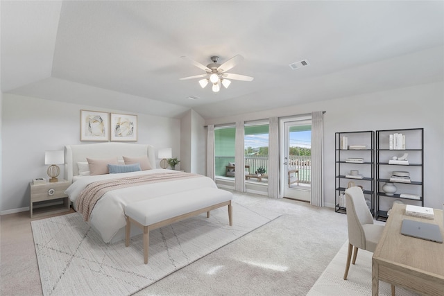 carpeted bedroom with ceiling fan, access to exterior, and lofted ceiling