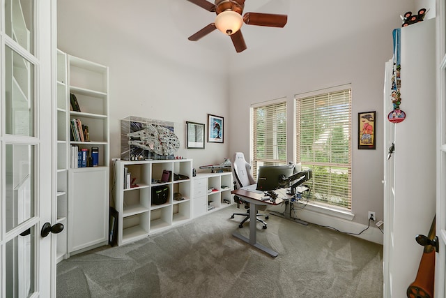 office featuring carpet and ceiling fan