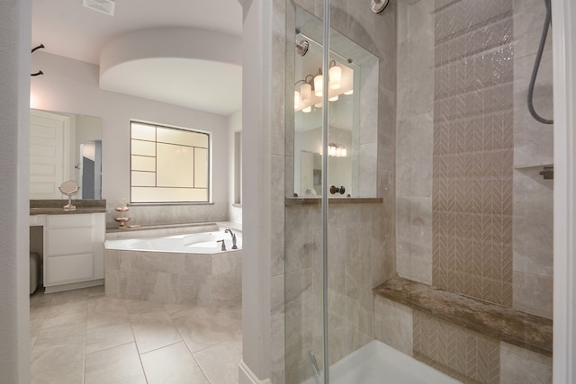 bathroom with vanity, tile patterned flooring, and separate shower and tub