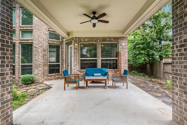 view of patio featuring ceiling fan