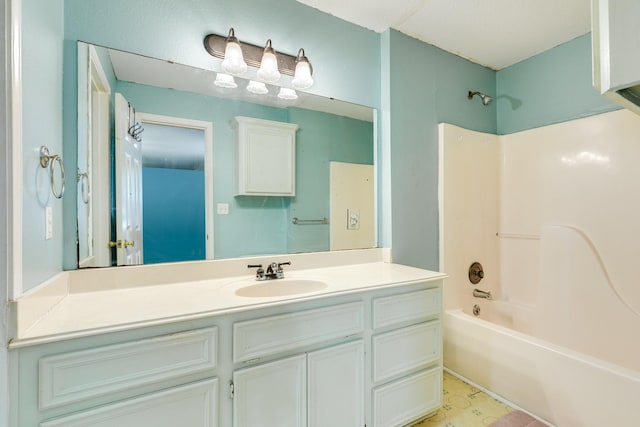 bathroom featuring vanity and shower / bathing tub combination