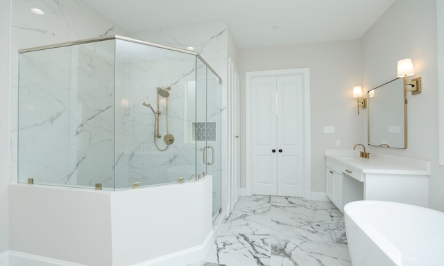 bathroom featuring vanity and independent shower and bath