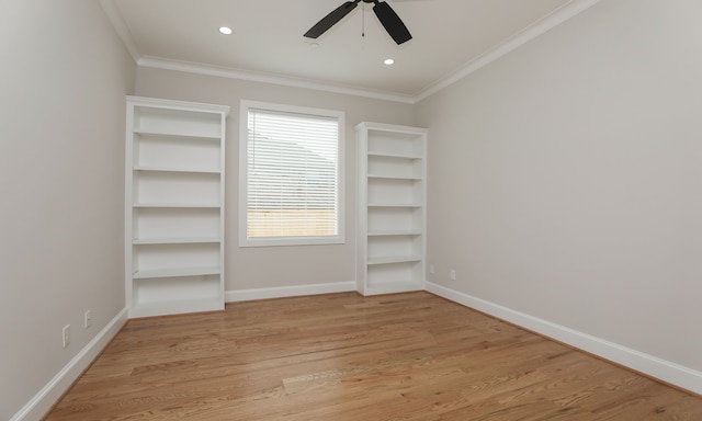 unfurnished bedroom featuring ornamental molding, light wood-type flooring, and ceiling fan