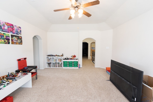 playroom with carpet floors and ceiling fan