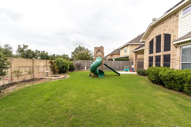 view of yard featuring a playground