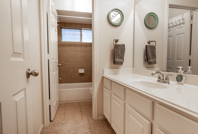 full bathroom with shower / tub combo with curtain, vanity, tile patterned floors, and toilet