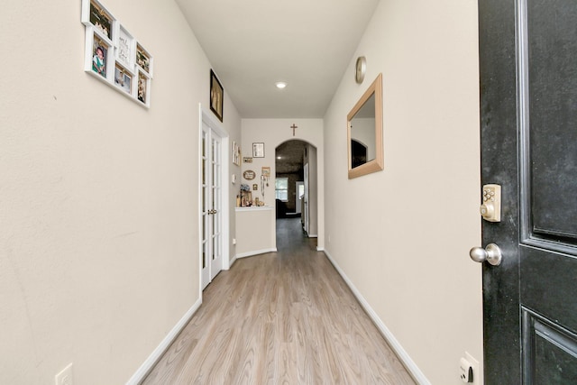 hall featuring light hardwood / wood-style floors