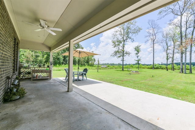 view of patio featuring ceiling fan