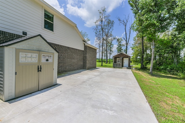 view of patio / terrace with a storage shed