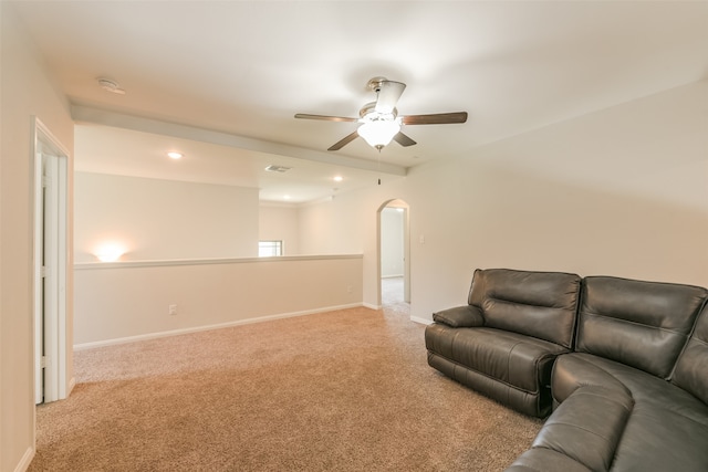 living room featuring light carpet and ceiling fan