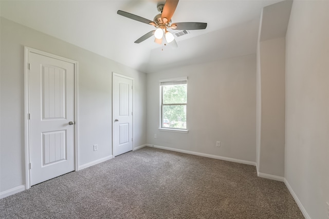 unfurnished bedroom with carpet flooring and ceiling fan