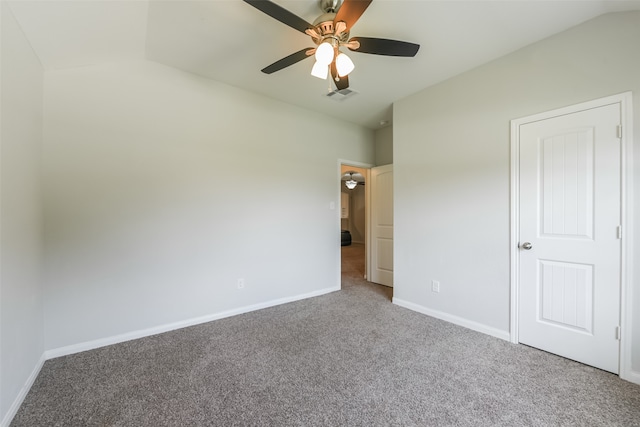 unfurnished bedroom with carpet, ceiling fan, and lofted ceiling