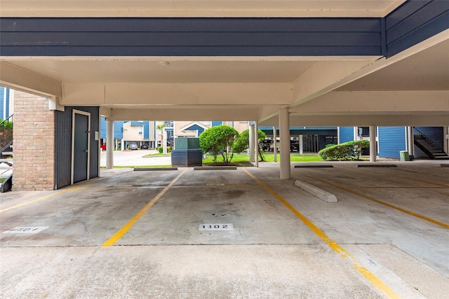 garage with a carport