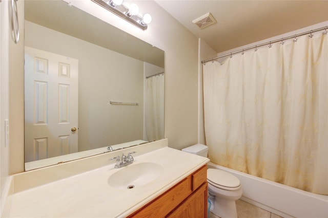 full bathroom with tile patterned flooring, vanity, toilet, and shower / tub combo