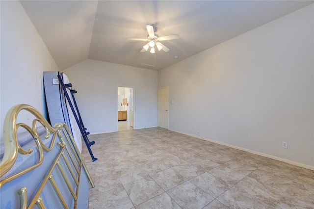 unfurnished room with ceiling fan and lofted ceiling