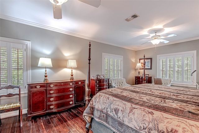 bedroom featuring multiple windows, ceiling fan, and dark wood-type flooring