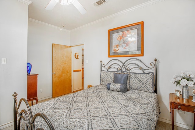 bedroom with crown molding, carpet floors, and ceiling fan