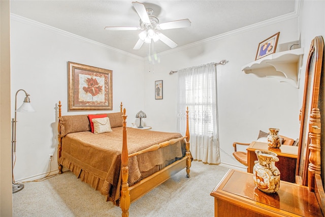 bedroom with ceiling fan, ornamental molding, and light carpet