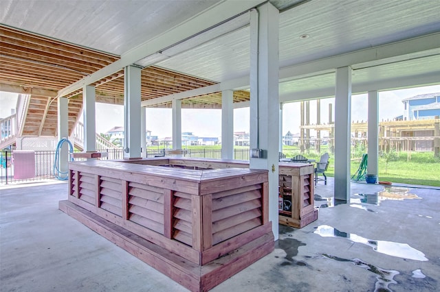 view of patio with an outdoor bar