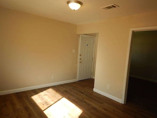 11503 Bay Cedar Dr, Houston, TX 77048 - spare room featuring wood finished floors and baseboards