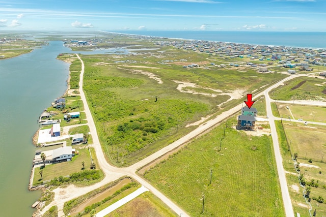 aerial view featuring a rural view and a water view