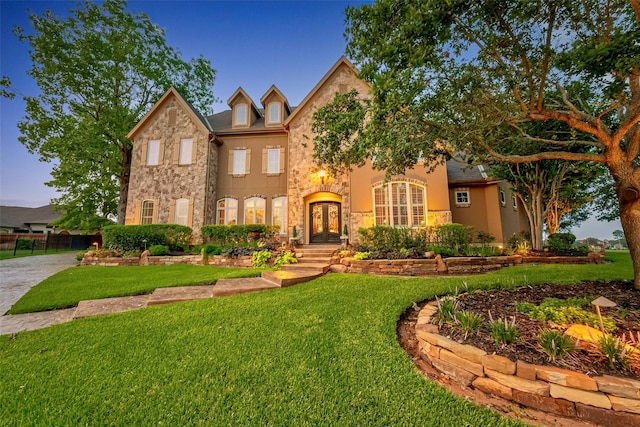 view of front facade with a lawn