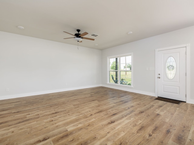 entrance foyer featuring ceiling fan and light wood-type flooring