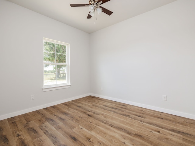 unfurnished room featuring ceiling fan and light hardwood / wood-style flooring