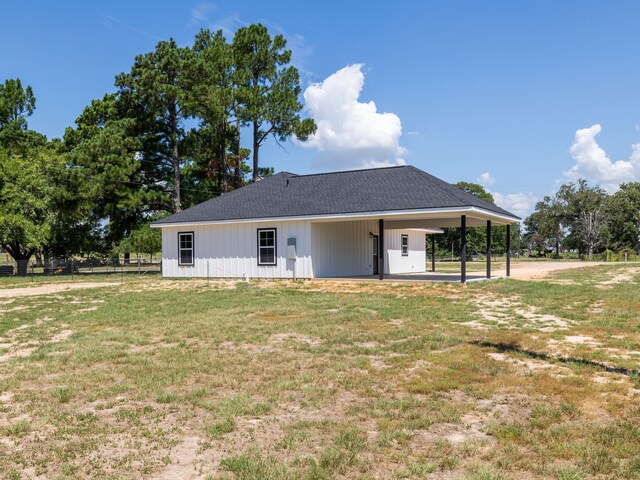 exterior space featuring a yard and a patio area