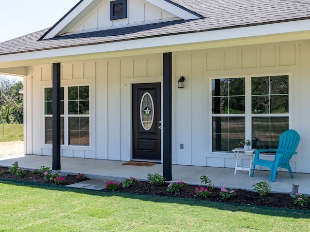 property entrance featuring a porch