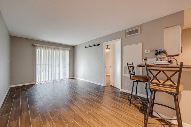 interior space with hardwood / wood-style floors