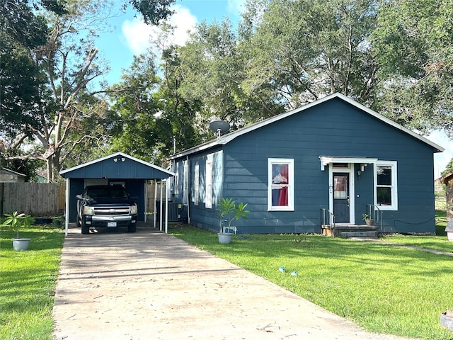 bungalow-style home featuring a front yard and a carport