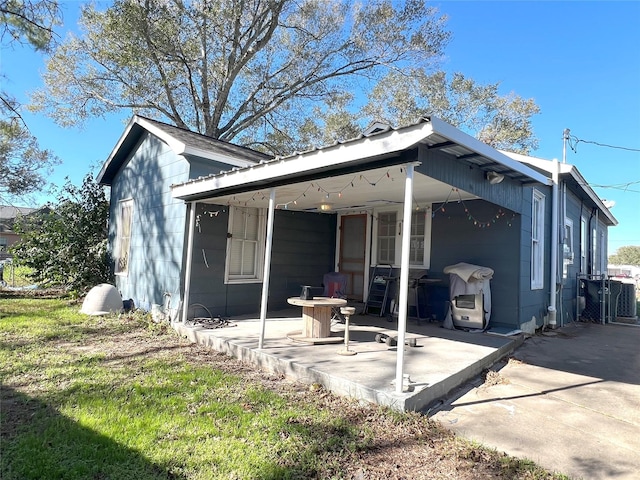 rear view of house featuring a patio