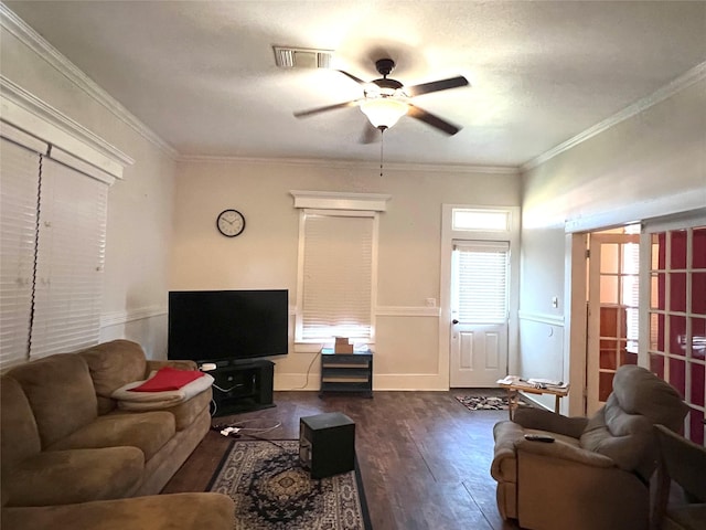 living room featuring ceiling fan, dark wood-type flooring, and ornamental molding