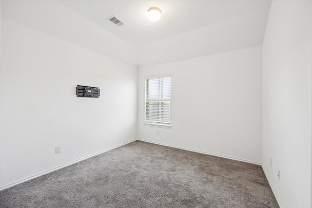 empty room with carpet flooring