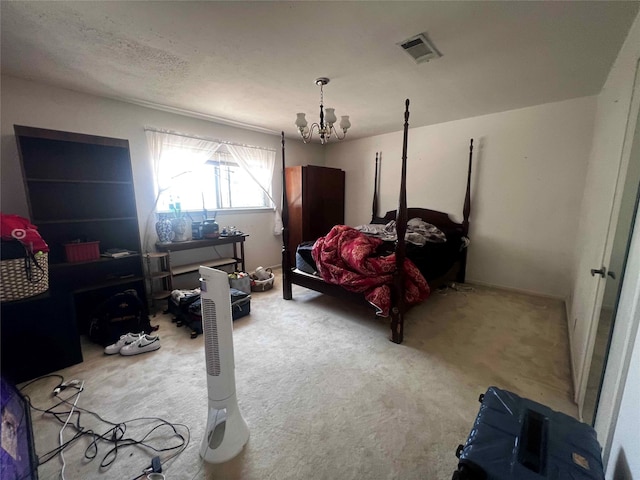 bedroom featuring a textured ceiling, a notable chandelier, and carpet flooring