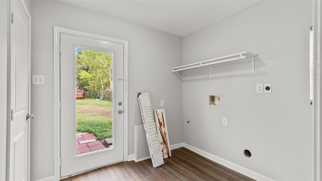 washroom featuring dark hardwood / wood-style floors, washer hookup, and hookup for an electric dryer