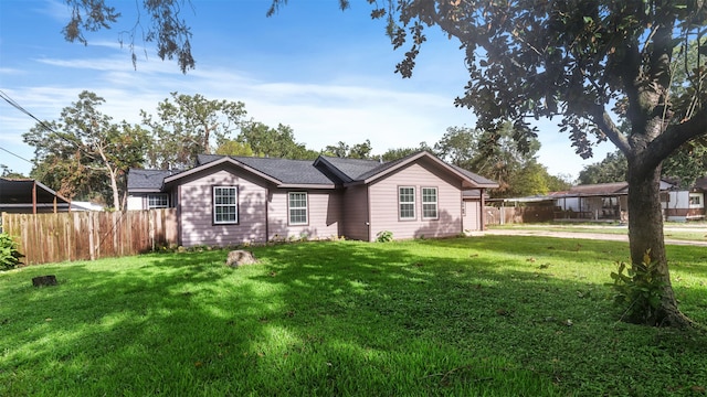 ranch-style house with a front yard