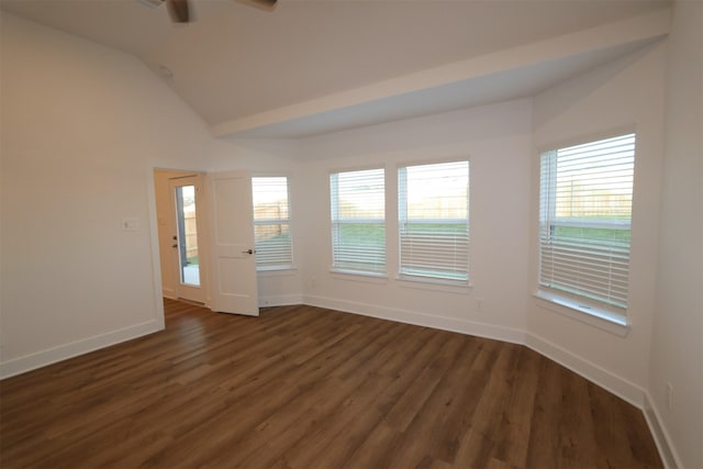 empty room with lofted ceiling and dark hardwood / wood-style floors