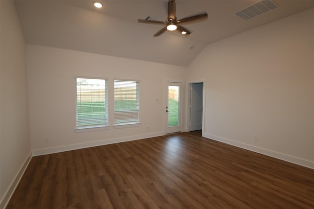 unfurnished room with dark hardwood / wood-style flooring, vaulted ceiling, and ceiling fan