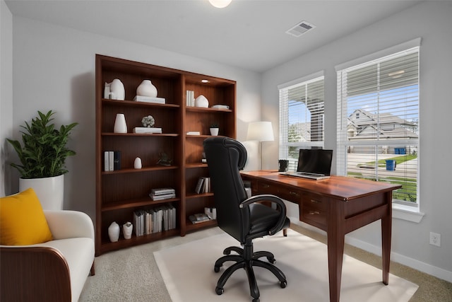 view of carpeted office space