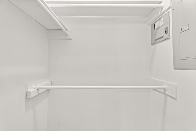 walk in closet featuring electric panel