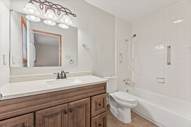 full bathroom with tiled shower / bath combo, vanity, tile patterned flooring, and toilet